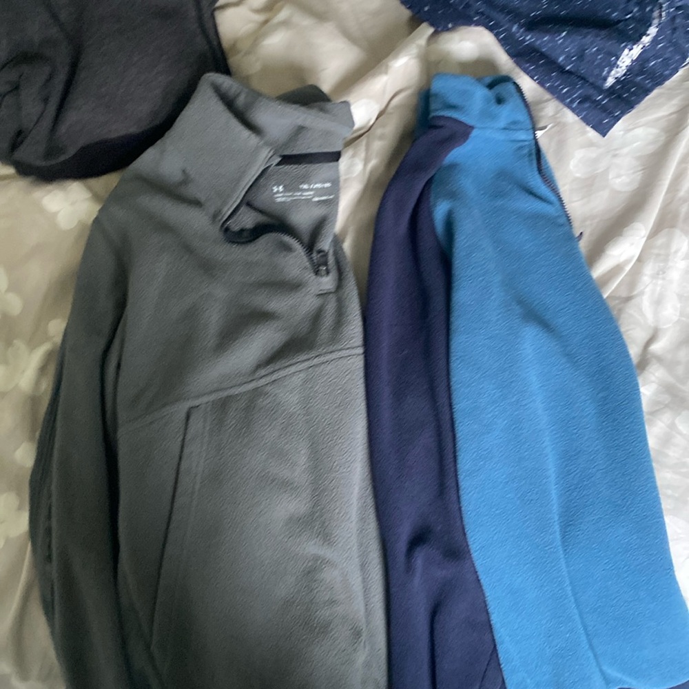 Two youth XL quarter zip sweaters they are from Gymboree and under armor